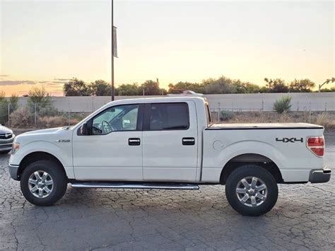 pre owned  ford   xlt wd crew cab pickup