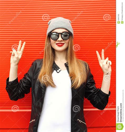 fashion stylish cool girl having fun wearing a rock black leather