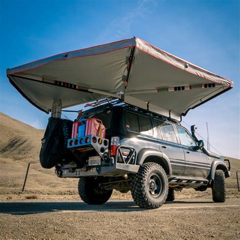 wraptor   degree freestanding vehicle mounted awning  shipping overland pros