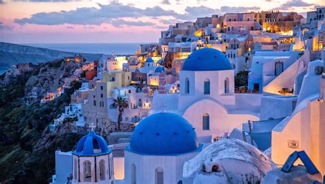 sunset  oia santorini  amazing photography locations earth trekkers