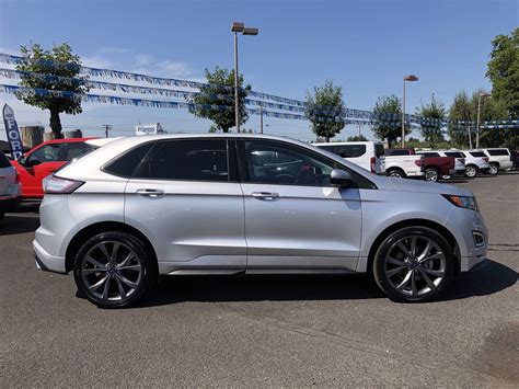 pre owned  ford edge sport awd