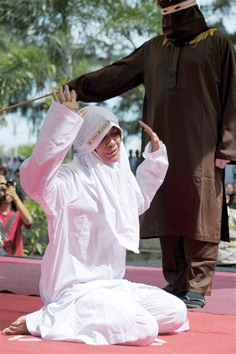 Indonesian Woman Screams In Pain During Aceh Caning