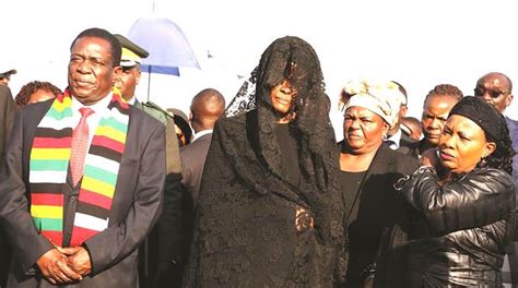 Another Grace Mugabe Lacoste Drama Amai Covers Face At Harare Airport
