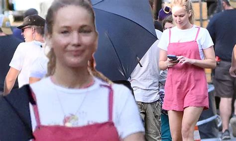Jennifer Lawrence Displays Toned And Tanned Legs In Romper On The Set