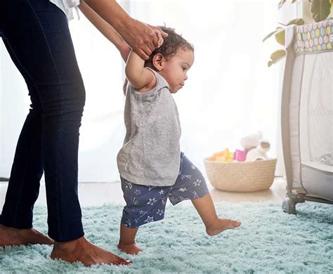 long  baby takes  steps   walk baby viewer