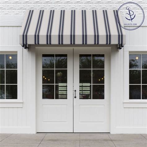 white double doors  striped awnings   front   storefront