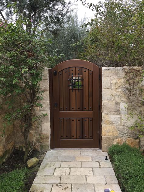 custom wood gate  garden passages tuscan style entry gate pool safe   wood gate