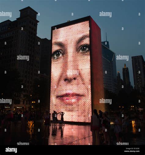 image   womans face projected   side   building chicago