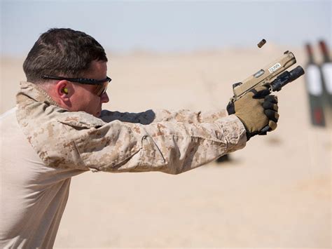 military     pistol    sidearms  carried  battle