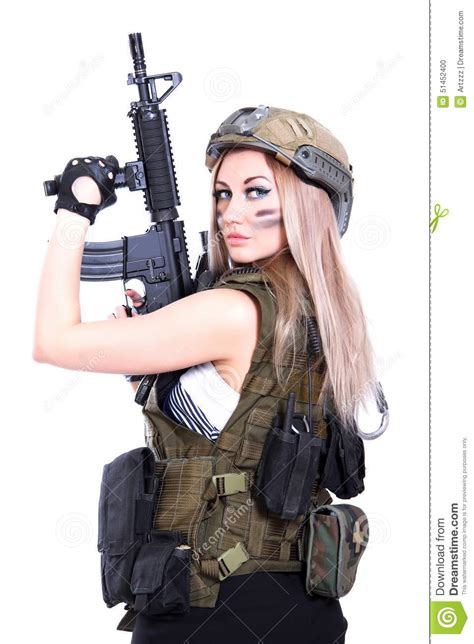 woman in a military camouflage holding the assault rifle