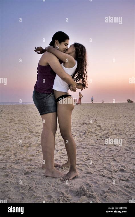 Lesbian Couple Kissing On Ipanema Beach Rio De Janeiro Brazil Stock
