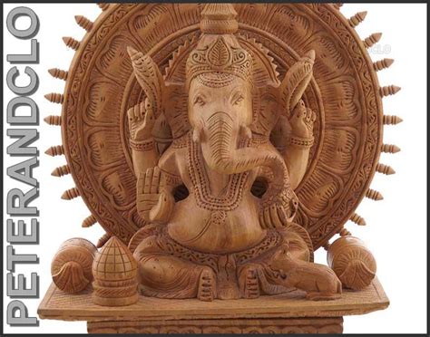 statue de ganesh elephant en bois  artisanat inde peterandclo