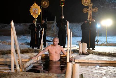 Russian President Vladimir Putin Takes Holy Dip In Icy Waters World