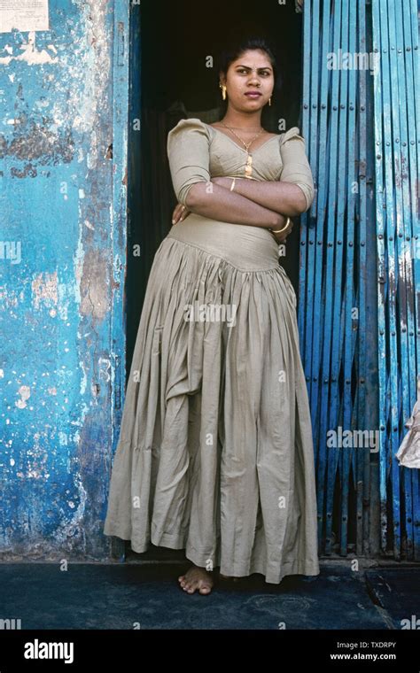 sex worker standing in front of house kamathipura mumbai maharashtra