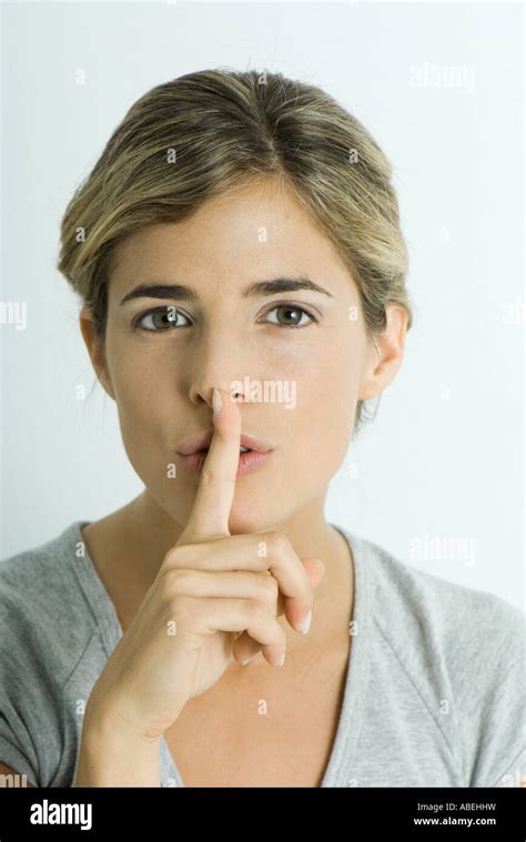 woman  finger  lips head  shoulders portrait stock photo