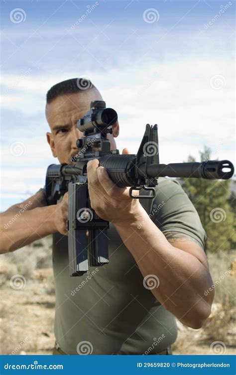 soldier aiming machine gun stock photo image