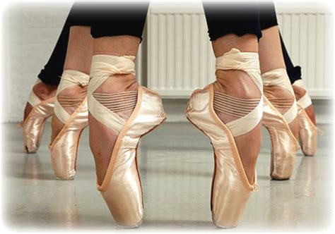 hands pointe ballet shoes
