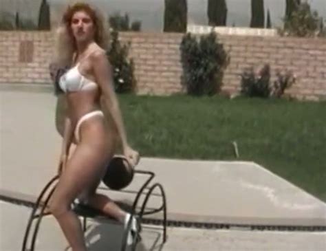 sassy bronze skin long legged blondie in white bikini