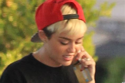 Miley Cyrus Sex T Shirt And Hot Pants Are A Strange Look Photos
