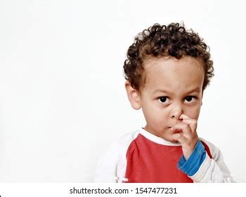 child picking  nose  fun stock photo  shutterstock