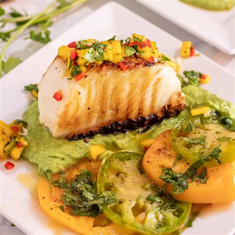 Mexican Grilled Sea Bass With Avocado Crema And Mango Salsa • Beyond