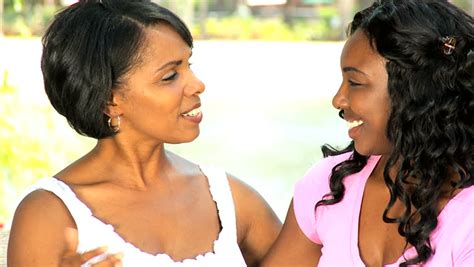 close up loving african american mother daughter spending
