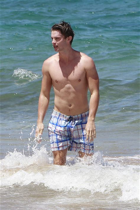 hottie in hawaii shirtless patrick schwarzenegger caught bending over while shirtless and