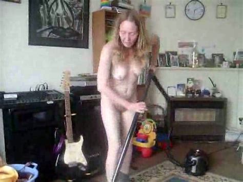 mature light haired flabby wife cleans the room all naked