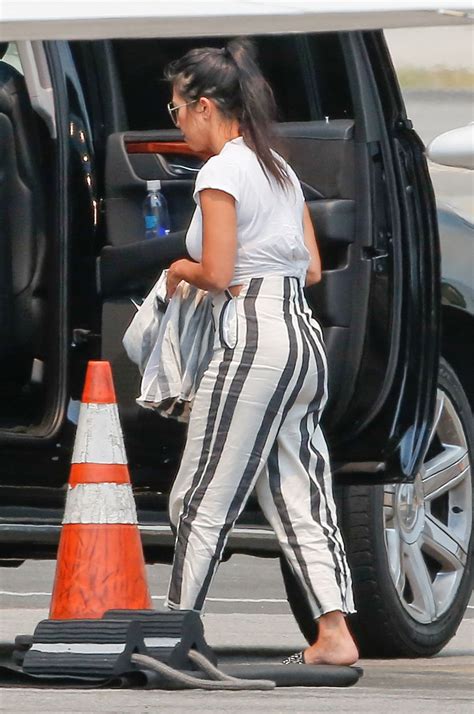 kourtney kardashian arrives back in los angeles 07 23 2016