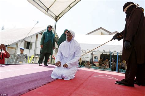 indonesian woman is forced to endure 26 lashes daily