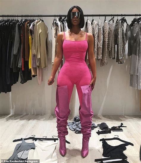 Kim Kardashian Flaunts Her Hourglass Curves In A Skin Tight Pink