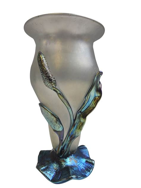 loetz vase with applied iridescent blue lily pad and rush floral