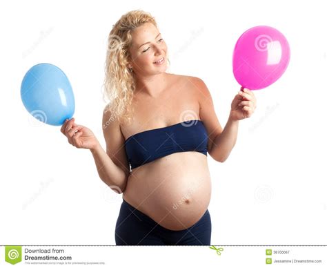 pregnant woman with blue and pink baloon stock image