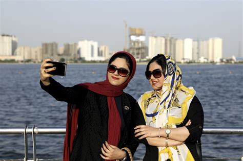 Some Iranian Women Take Off Hijabs As Hard Liners Push Back