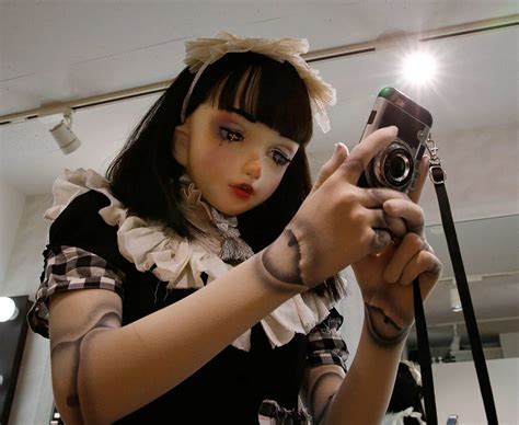 japan unveils human doll wearing wig mask and stockings daily star
