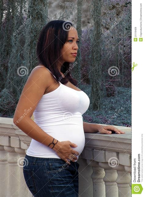 multiracial woman five months pregnant 2 royalty free