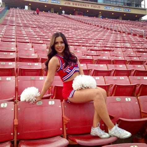 what s up with the fresno state cheerleaders sitting on the backs of stadium chairs