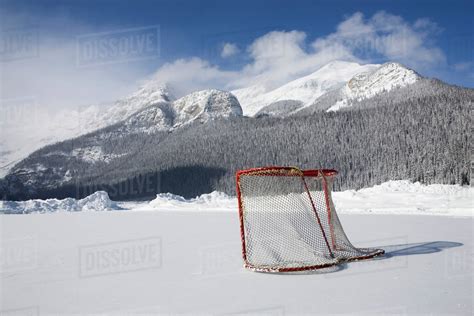 hockey net  outdoor ice rink lake louise alberta canada stock photo dissolve
