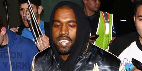 Kanye West Breaks Up Paparazzi Fight With Hug