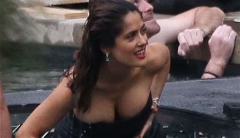 salma hayek s boobs fall out as she washes ashore
