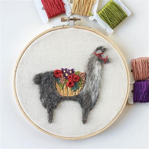 needle felted llamas carry beautiful embroidered blooms    needle felting punch