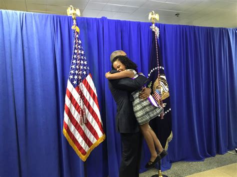 obama hugs little miss flint during visit to city