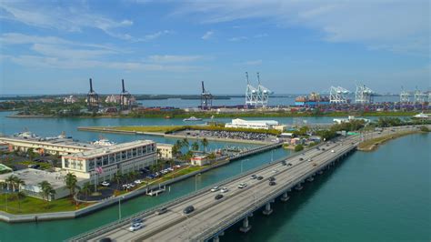 aerial drone footage miami macarthur causeway bridge port miami cranes stock footagemiami