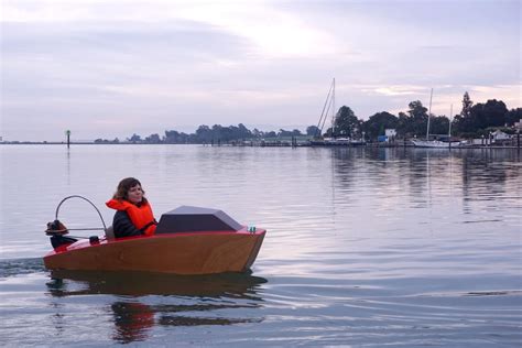 mini electric boat takes   water  pint sized motoring fun