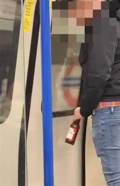 disgusting video shows man urinating over london underground carriage