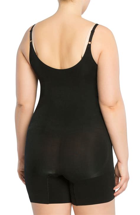 spanx spanx oncore open bust mid thigh shaper bodysuit in black lyst