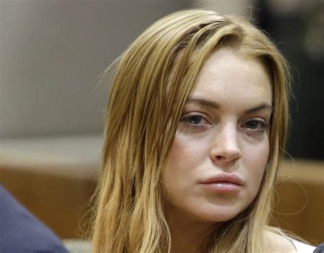 lindsay lohan mean girls star accused of spitting in patron s face after racist rant at new