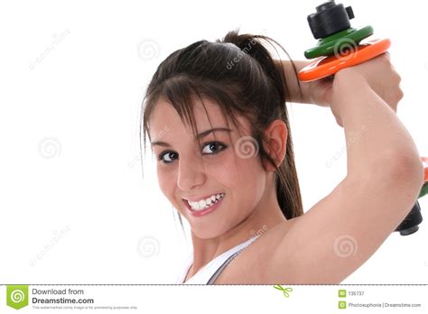 beautiful brunette teen with hand weights stock image image of people attractive 135737