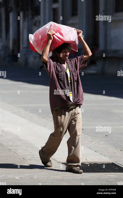 man carrying load  res stock photography  images alamy