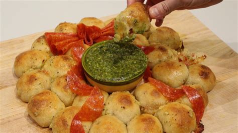 Pepperoni Pizza Stuffed Pull Apart Wreath With Pesto Dipping Sauce